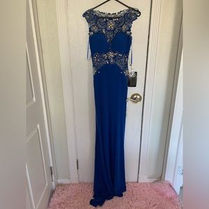 Beautiful blue dress. Never worn. Perfect for weddings.